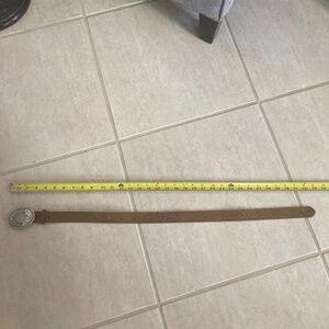 Cowgirl belt with heart buckle